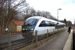 DSB Desiro MQ 4113 trainset photographed in Fruens Bøge 24. December 2004. The MQ class is built by Siemens in Germany. DSB has leased 12 units primarily for the line Odense - Svendborg. The type is used widely in Germany. The trainsets were put in service in Denmark in 2002. Two diesel engines of 315 kW per trainset. Max speed 120 km/h - 75 mph. Length 41 700 mm. Weight 68,2 metric tonnes. 114 seats 2nd class. Up to 3 trainsets can be put together.